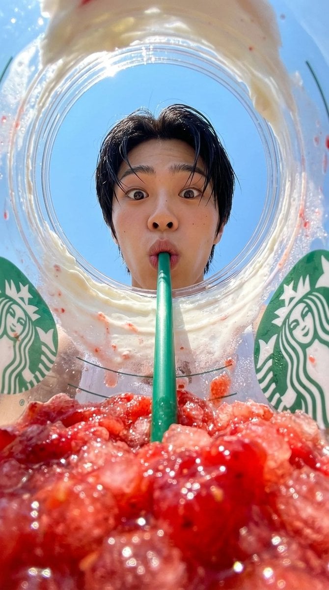 prompt: View from inside a Starbucks strawberry frappuccino cup looking up, fish... 变体图第2张 - 绘词工坊
